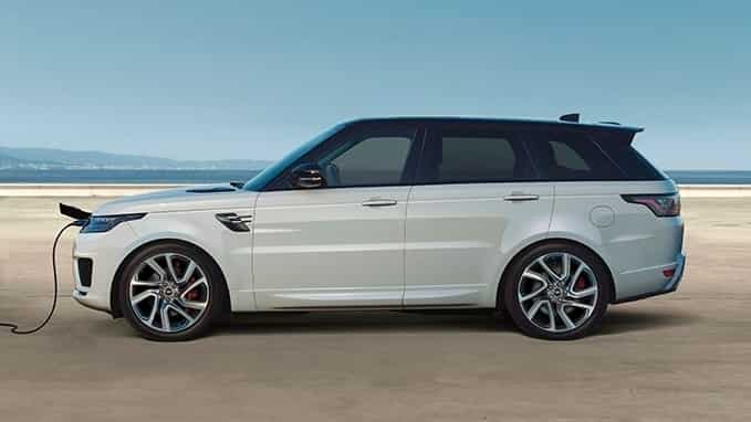 Land Rover vehicle in white is being charged