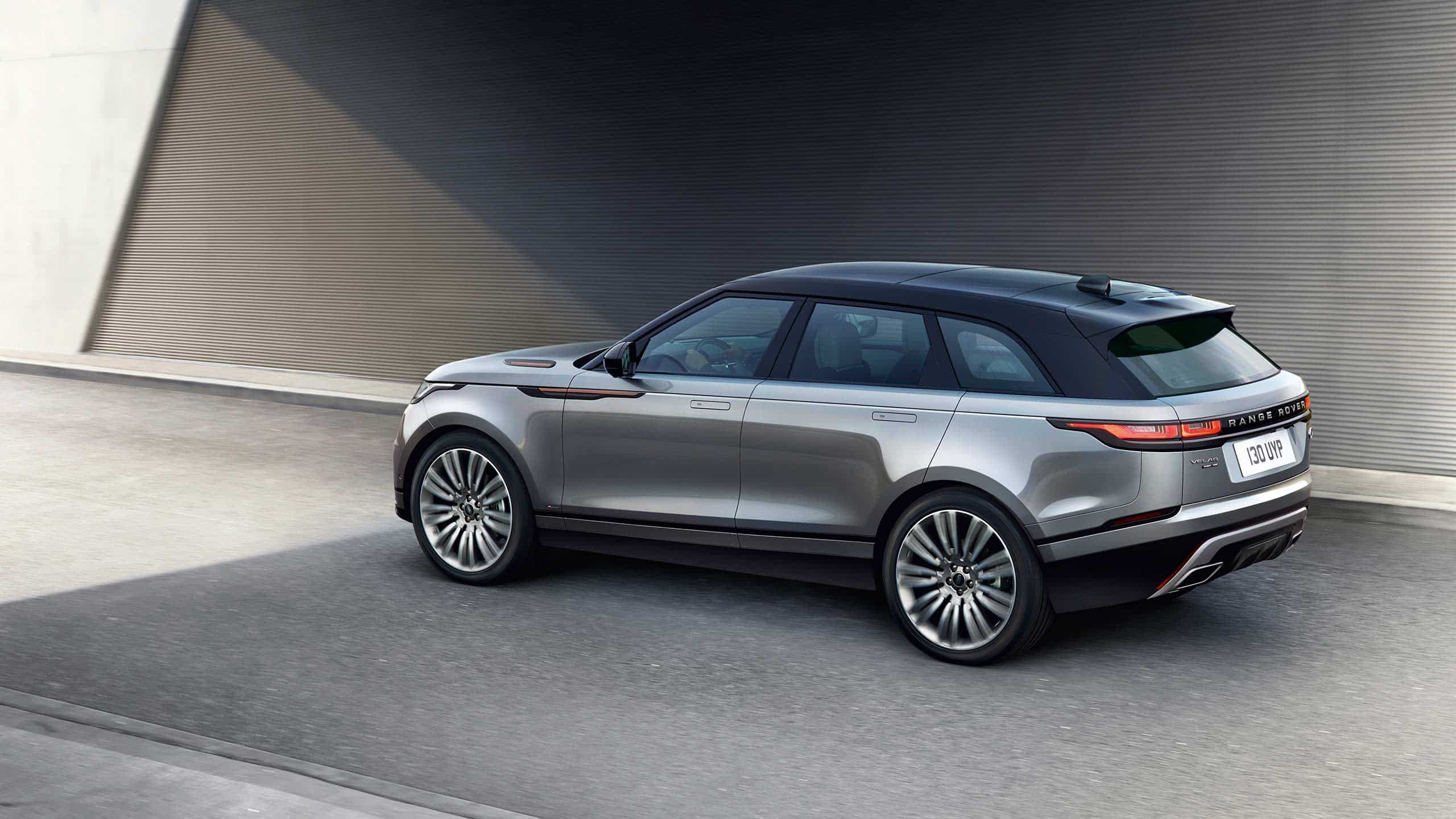 Range Rover Velar in grey driving on the road