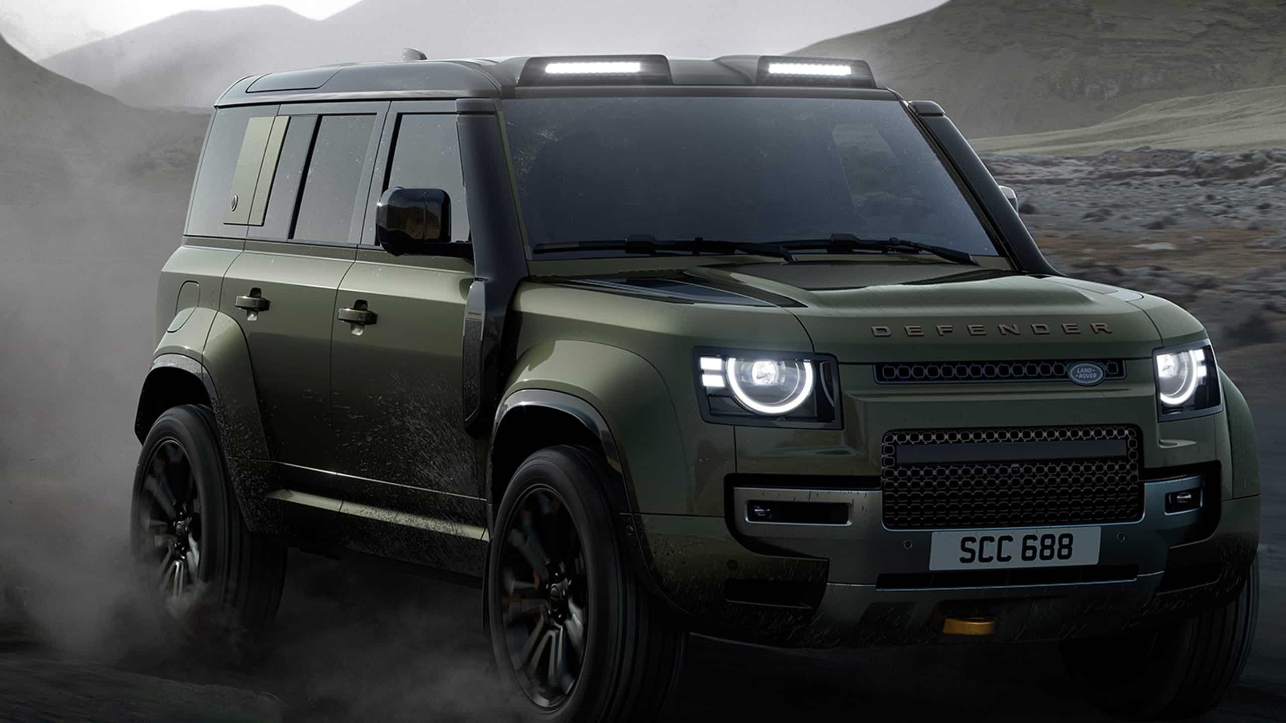 Defender runninng on sand dust road